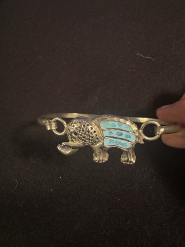 Silver tone bracelet with - tone,