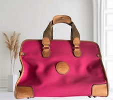 Élégante sac Lancel en toile rose et cuir, idéale pour le quotidien