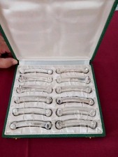 12 porte couteaux en métal