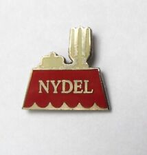 Pin's publicitaire Nydel nappe