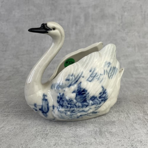 Figurine cygne bouquetière