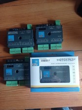 Lot de 4 decodeurs accessoires ESU switch pilot dont 1 totalement neuf.