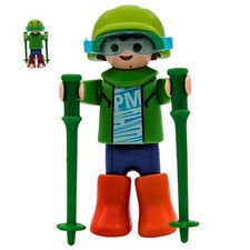 Figurine enfant vert bâtons