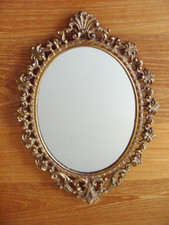 ANCIEN MIROIR EN BRONZE OVALE