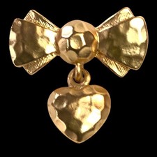 Broche vintage Coeur Noeud en métal doré signée Auriège Paris