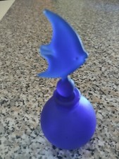 Flacon de parfum ancien forme boule avec bouchon poisson