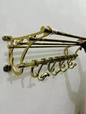 Porte-bagages mural en laiton