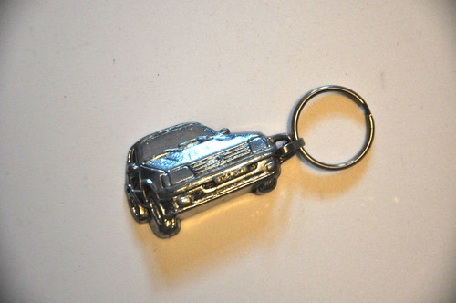 Ancien porte clé publicitaire