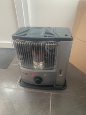 poêle à pétrole Zibro noir en bon état 