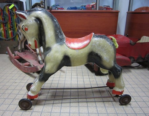 X422 cheval bascule en - cheval, a