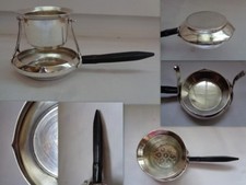 PASSE THE PASSOIRE A THE A BASCULE EN METAL ARGENTE  MANCHE BOIS