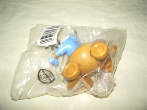 Figurine genie sur chariot - ",
