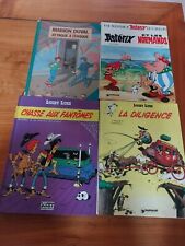 lot de 4  bd 2 lucky luke 1 asterix 1 marion duval. be
