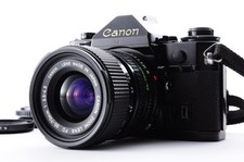 Canon A-1 / Objectif neuf FD 35-70mm f/3.5-4.5 [Très bon] reflex Y3499