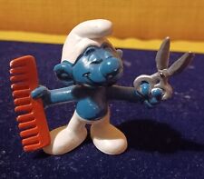 Figurine Schtroumpf coiffeur. Occasion
