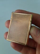 Ancien briquet métal doré ST
