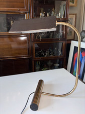 Christian LIAIGRE (dans le gout de)  Lampe à poser en métal doré. Hauteur 52 cm