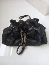 sac Dior noir en tres bonne état