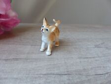 Miniature chat orange tigré