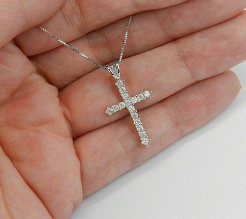 Collier pendentif croix serti