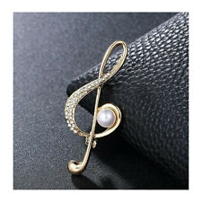 Broche bijou doré Clé de Sol