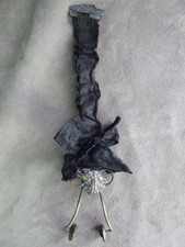 PINCE A VÊTEMENT "SAUTE-RUISSEAU" à décor d'aigle. XIXème.