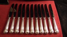 Service de 11 couteaux de