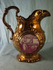 Pichet XIXème en faïence de Jersey, décor aux deux médaillons hauteur 15,5 cm