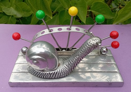 Porte piques escargot en - piques, a