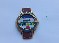 EB85 pin's doré montre