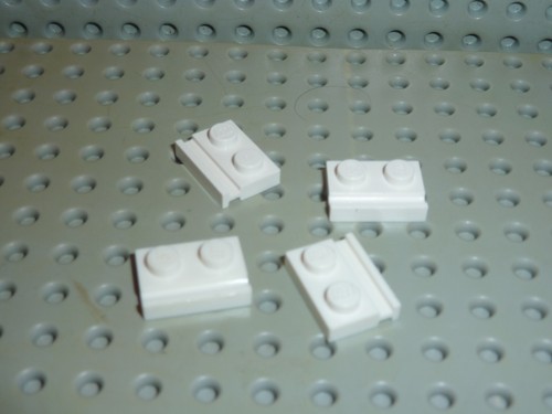 Lego white plates with - white,