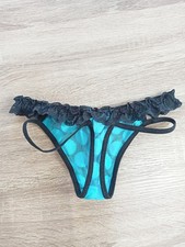 String / Tanga à pois bleu détails en dentelle noire