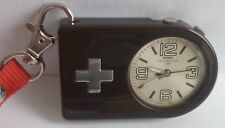 Réveil NEPRO MINISWISS, boîtier ABS couleur chocolat, cadran argenté, Suisse