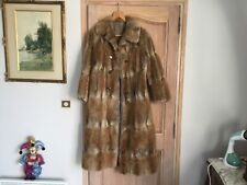 manteau en fourrure rat