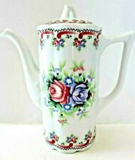 Grande chocolatière, théière, en porcelaine décor floral au bouquet de roses.