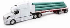 Camion 1/32ème VOLVO VN780 remorque plate avec tuyaux