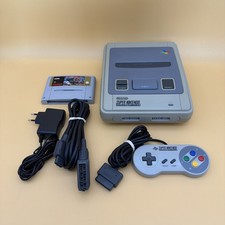 Console  SUPER NINTENDO  avec câble  + Manette + street fighter