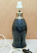 ancien pied de lampe en terre cuite style ogive D'obus noir et argenté 