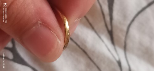 Une bague carats 12 - une,