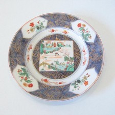Chine. Compagnie des Indes. Assiette en porcelaine décor famille verte
