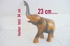 *Grand  éléphant en  bois  sculpté main - ht= 34 cm -long  23 cm