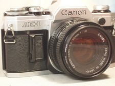 Canon avec objectif - canon,