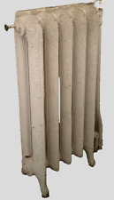 Radiateur ancien sur pieds a cinq lames fleuries en fonte de fer XX siècle