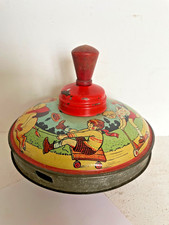 TOUPIE ancienne en tole polychrome