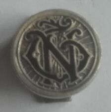 ancien insigne de boutonniere drago a identifier roue a rayon