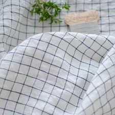 Lin lavé Sana blanc quadrillé bleu [au demi-mètre]