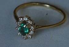 Bague marguerite en or sertie
