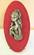 Portrait de femme en étain