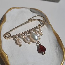 Broche pierre précieuse - en,