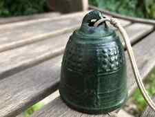 petite cloche en fonte